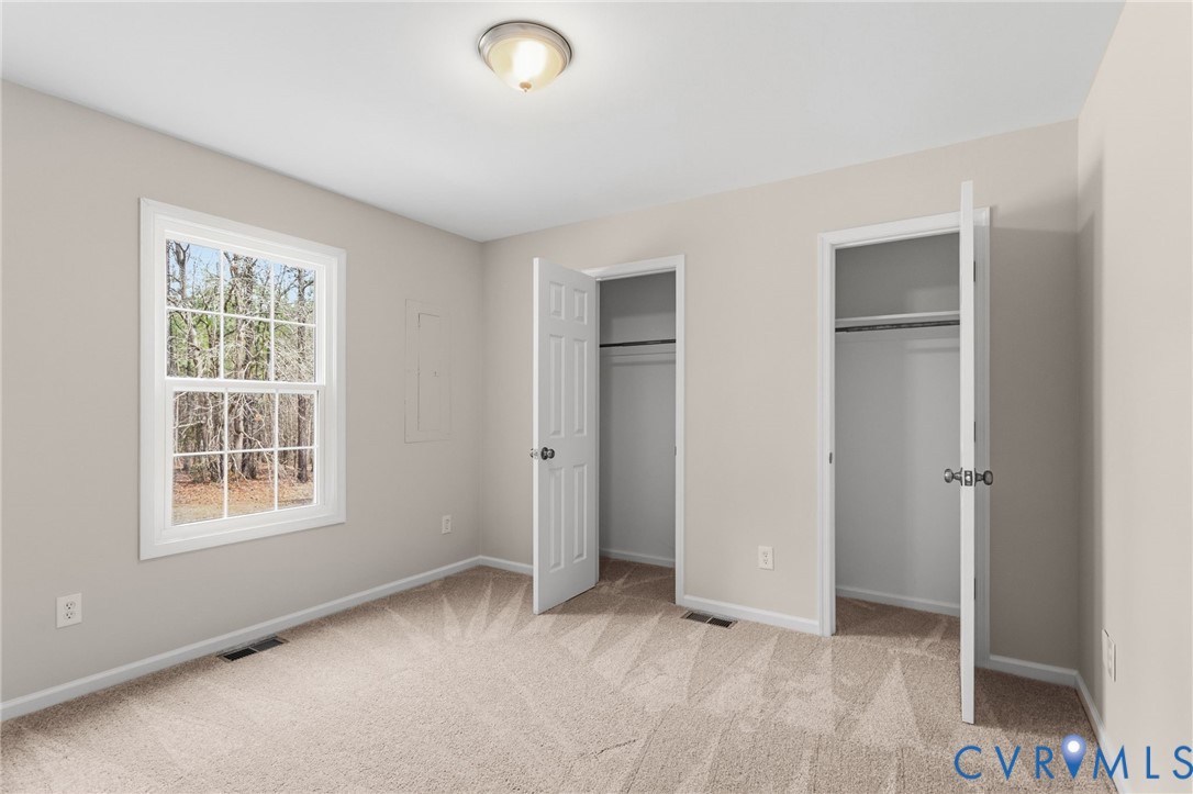 14624 Wilkinson Road Dewitt, VA 23840 - Photo 15 of 47 an empty room with windows and closet