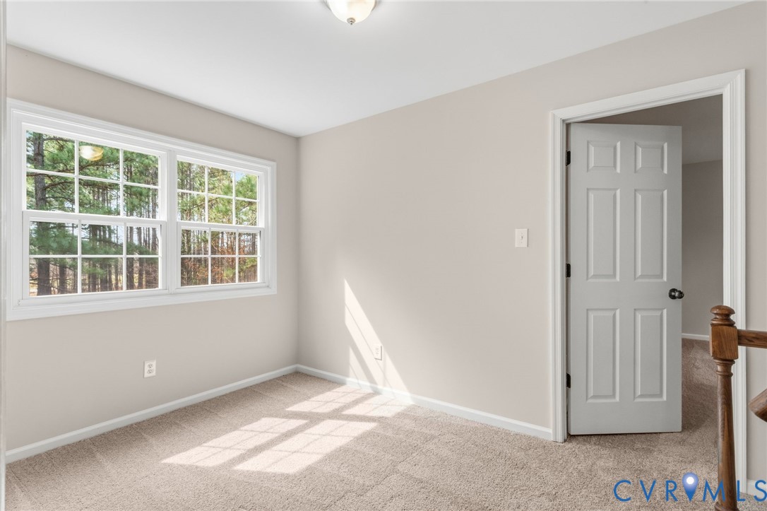 14624 Wilkinson Road Dewitt, VA 23840 - Photo 20 of 47 a view of empty room with windows