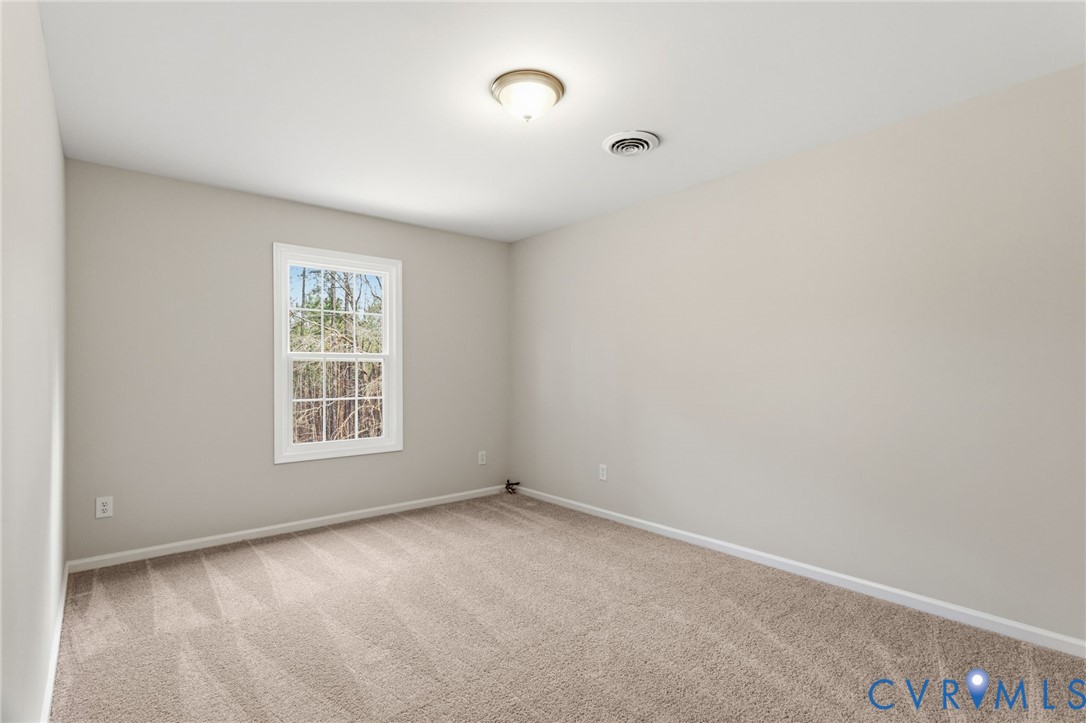 14624 Wilkinson Road Dewitt, VA 23840 - Photo 21 of 47 an empty room with a window