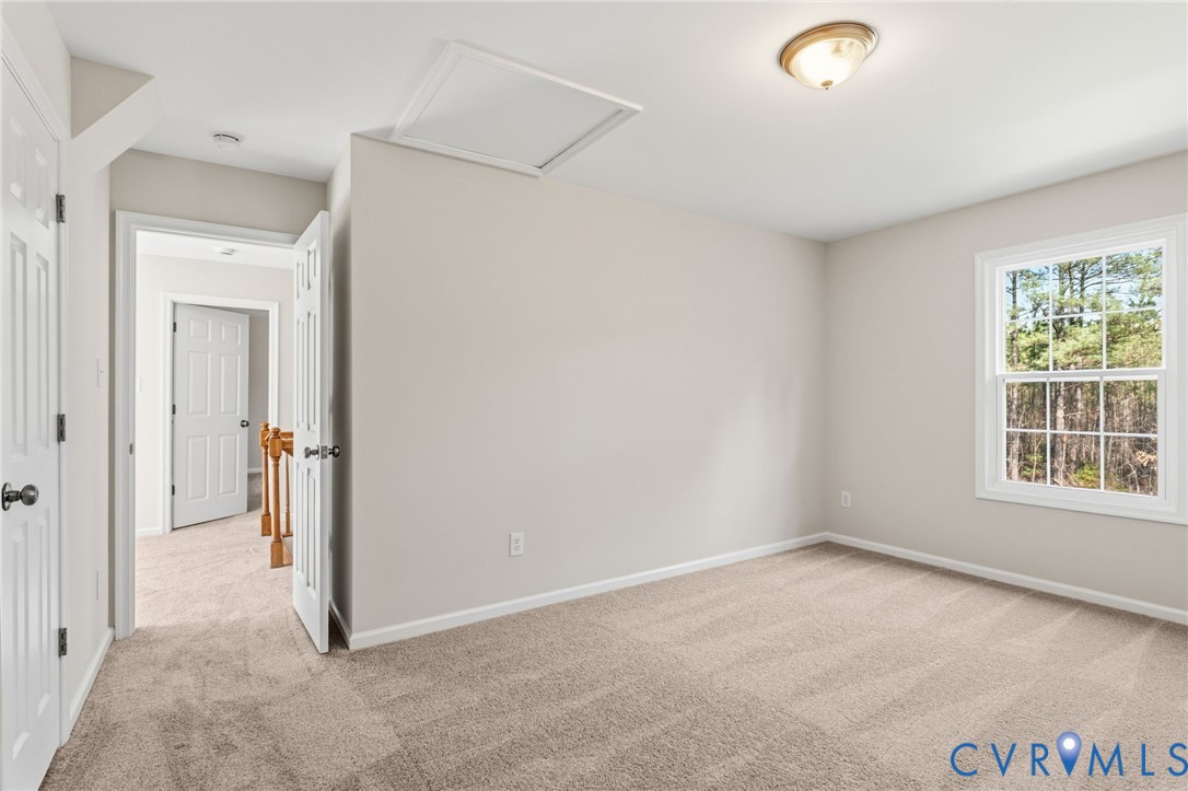 14624 Wilkinson Road Dewitt, VA 23840 - Photo 22 of 47 an empty room with windows and closet