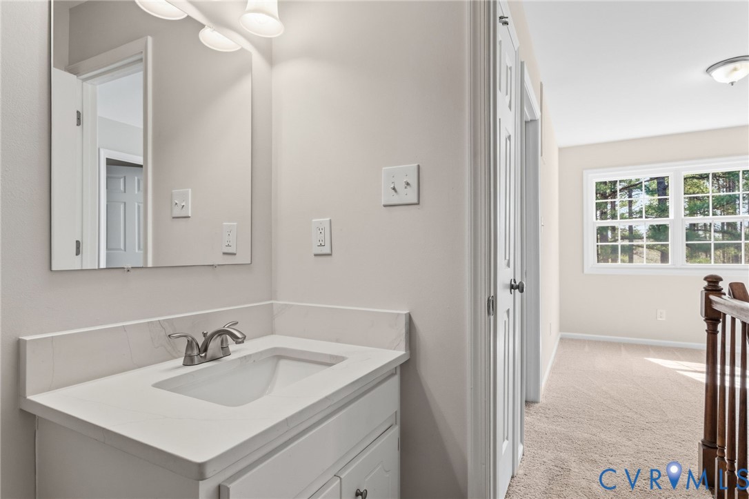 14624 Wilkinson Road Dewitt, VA 23840 - Photo 26 of 47 a bathroom with a sink and a mirror