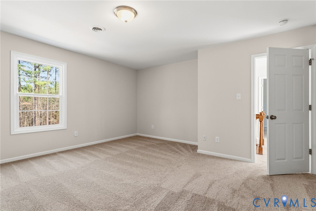 14624 Wilkinson Road Dewitt, VA 23840 - Photo 29 of 47 a view of an empty room with a window