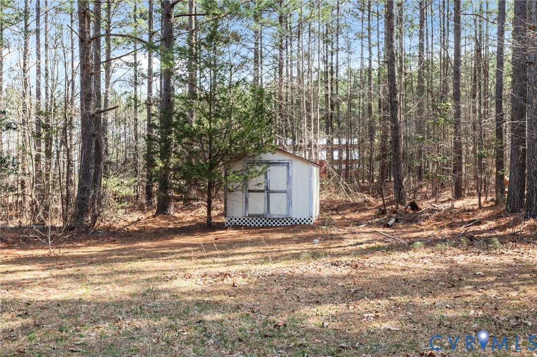 14624 Wilkinson Road Dewitt, VA 23840 - Photo 33 of 47 a view of a yard with large trees
