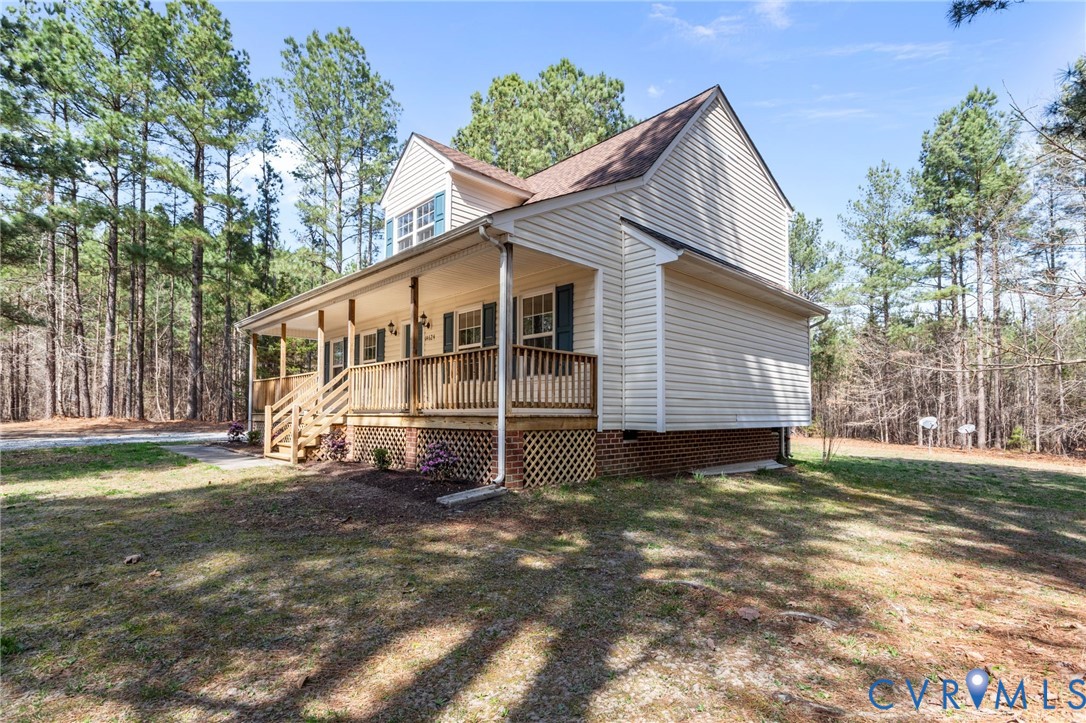 14624 Wilkinson Road Dewitt, VA 23840 - Photo 38 of 47 a view of a house with a yard
