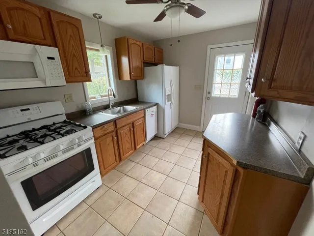 a kitchen with a stove and a microwave