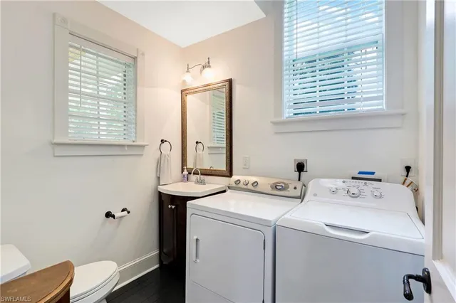 a balcony with furniture and wooden deck