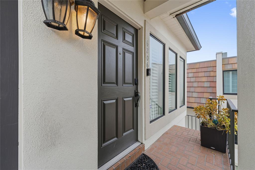6206 Masters Boulevard, Unit 302 Orlando, FL 32819 - Photo 25 of 32 a view of porch with seating space