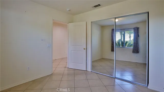 a view of a room that has a window in it