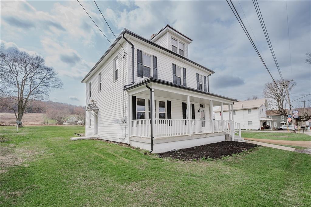 4992 Richmond Road Rochester Mills, PA 15771 - Photo 2 of 34 a view of a house with a yard