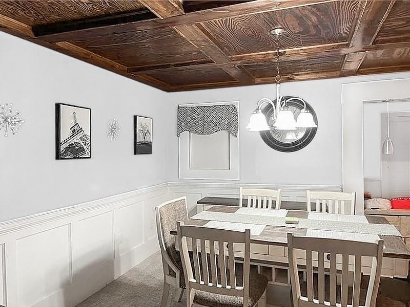 205 Stone Church Road Grindstone, PA 15442 - Photo 11 of 25 a dining room with a table and chairs