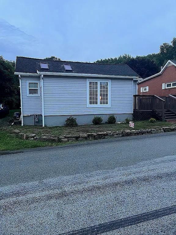 205 Stone Church Road Grindstone, PA 15442 - Photo 25 of 25 a front view of a house with a yard and garage