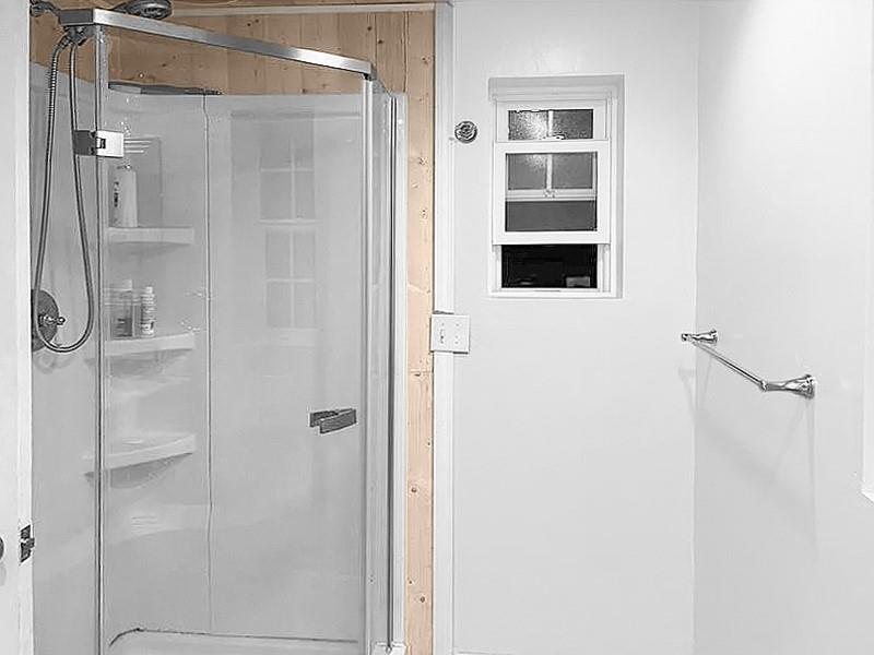 205 Stone Church Road Grindstone, PA 15442 - Photo 6 of 25 a bathroom with a shower and a mirror