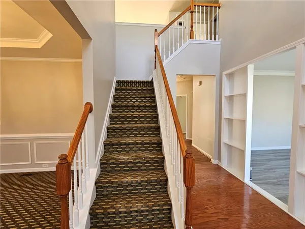 a view of a livingroom with a staircase