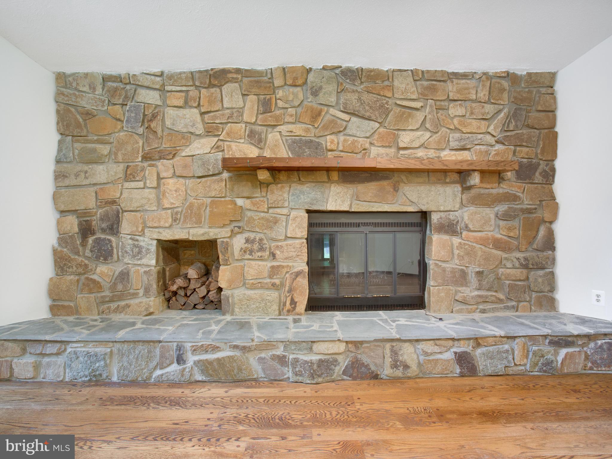 7605 Maple Branch Road Clifton, VA 20124 - Photo 4 of 30 Stunning stone, wood burning Fireplace