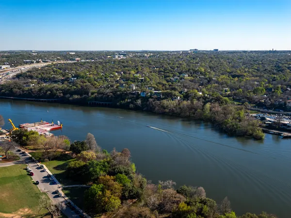 a view of a lake with a city