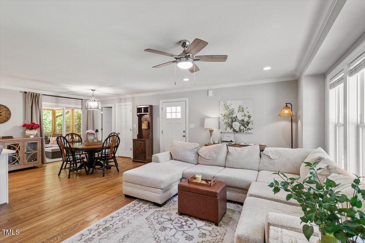 2222 Watkins Street Raleigh, NC 27604 - Photo 4 of 17 a living room with furniture potted plant and a window