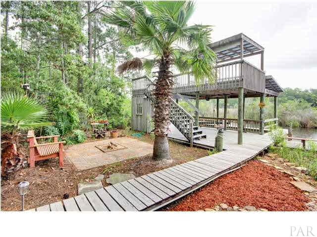 554 Riola Place Pensacola, FL 32506 - Photo 3 of 20 Boat house with power and observation deck on top