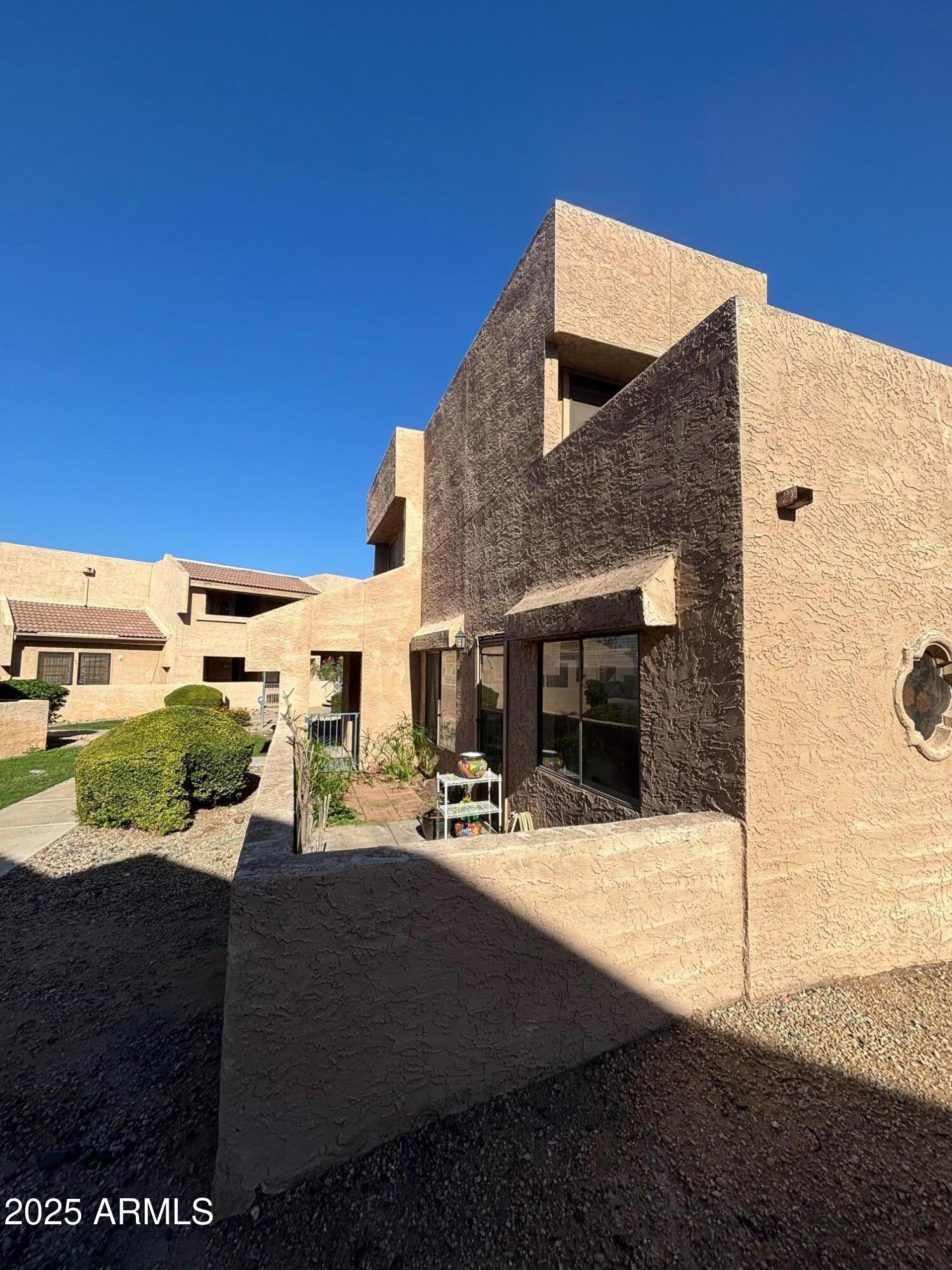 10828 North Biltmore Drive, Unit 154 Phoenix, AZ 85029 - Photo 17 of 23 a view of house with outdoor space