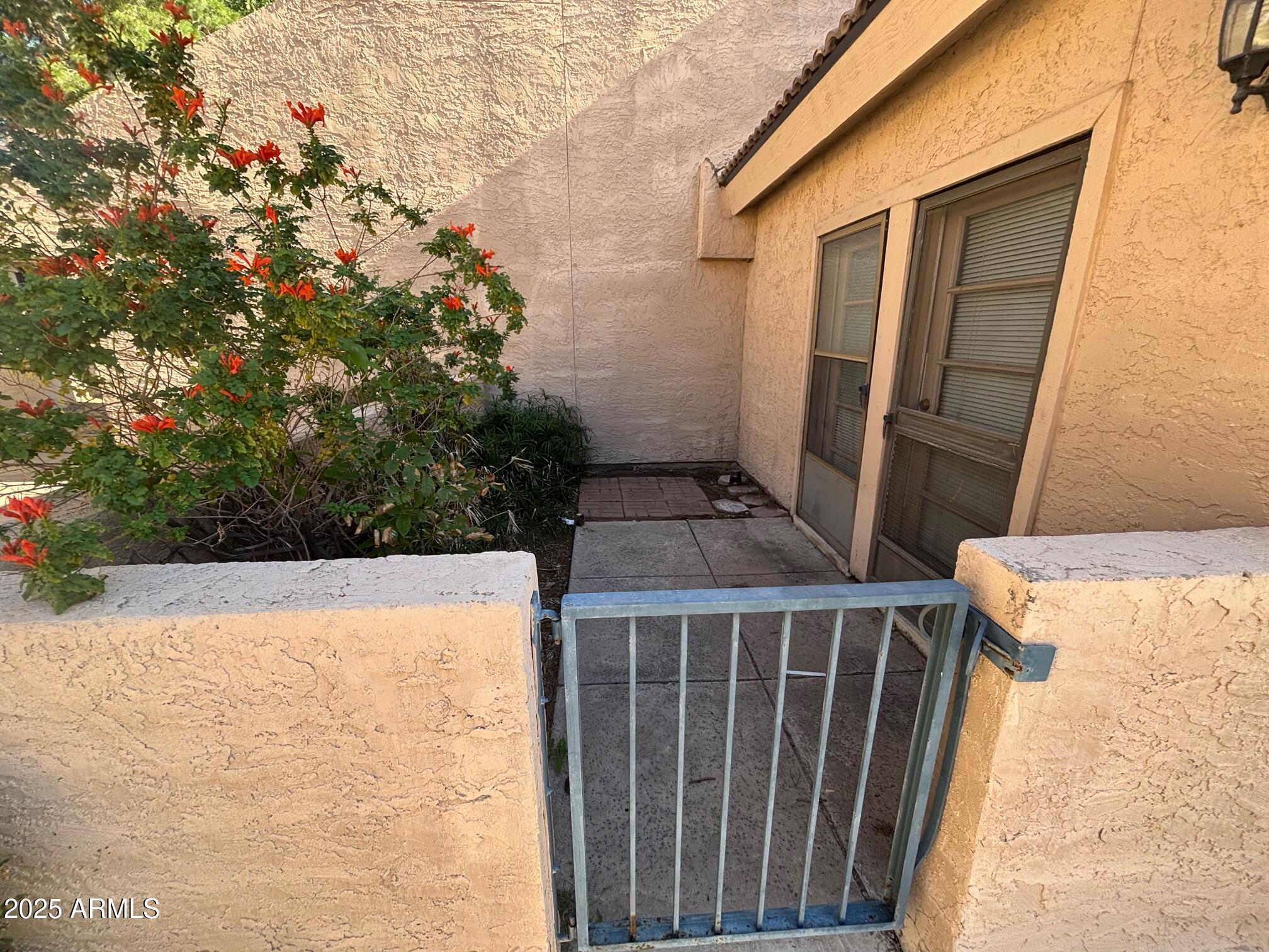 10828 North Biltmore Drive, Unit 154 Phoenix, AZ 85029 - Photo 19 of 23 a house view with a outdoor space