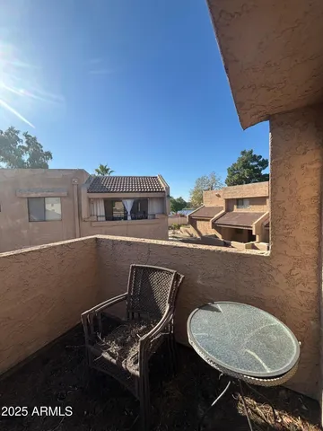 a view of a chairs and table in a microwave