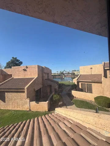 a view of a house with a terrace