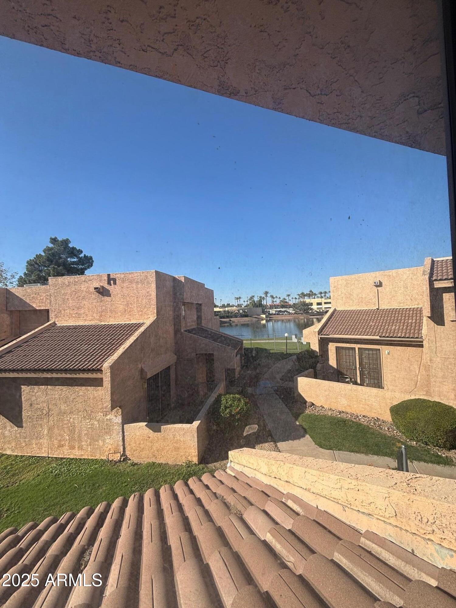 10828 North Biltmore Drive, Unit 154 Phoenix, AZ 85029 - Photo 22 of 23 a view of a house with a terrace