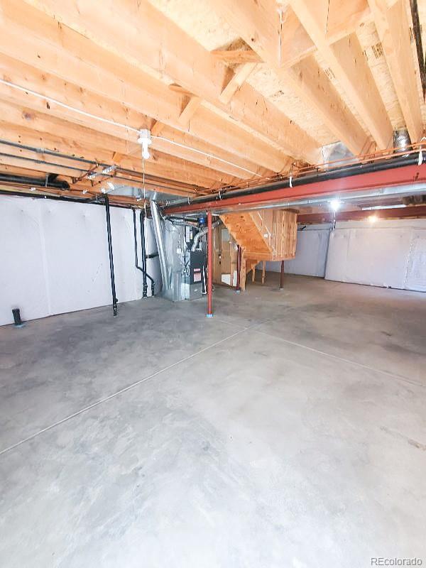 4934 South Danube Street Aurora, CO 80015 - Photo 21 of 22 a view of car garage