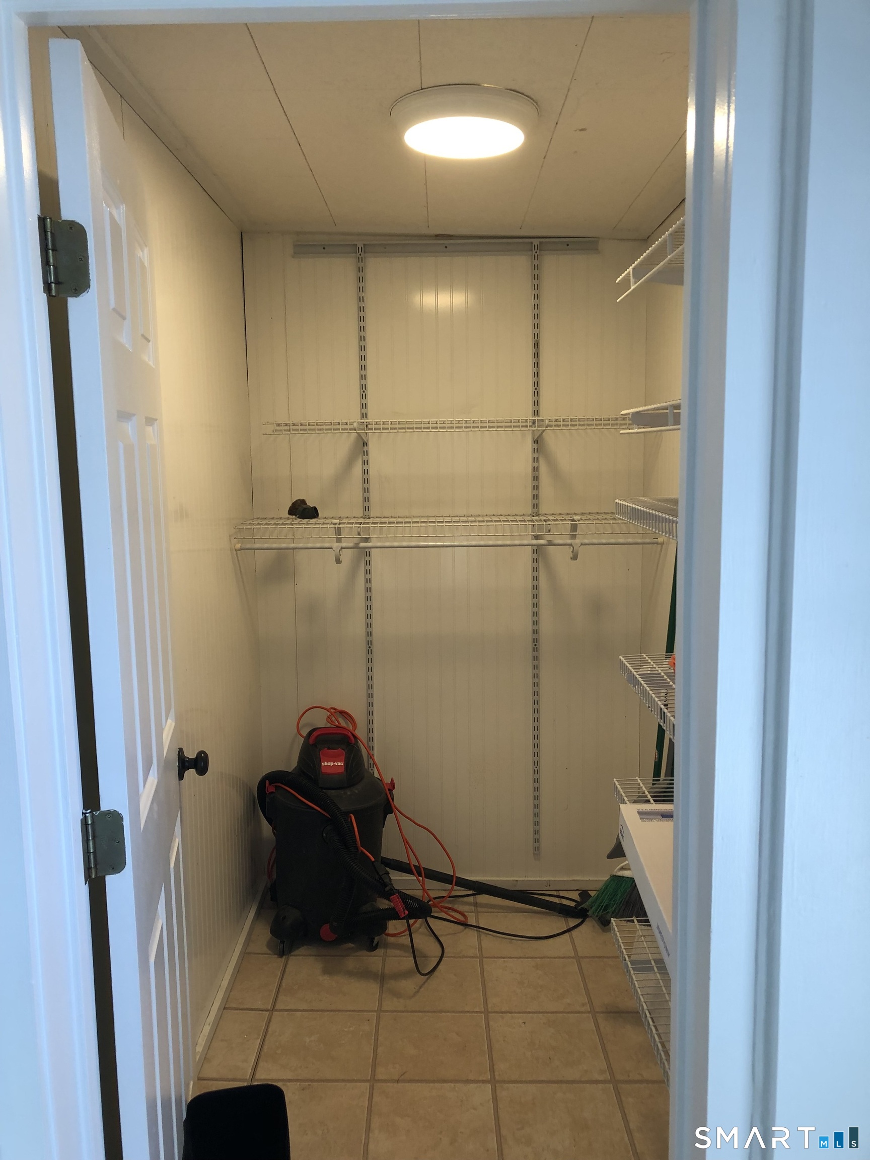 23 Taylor Street Torrington, CT 06790 - Photo 6 of 16 a bathroom with a mirror and shower