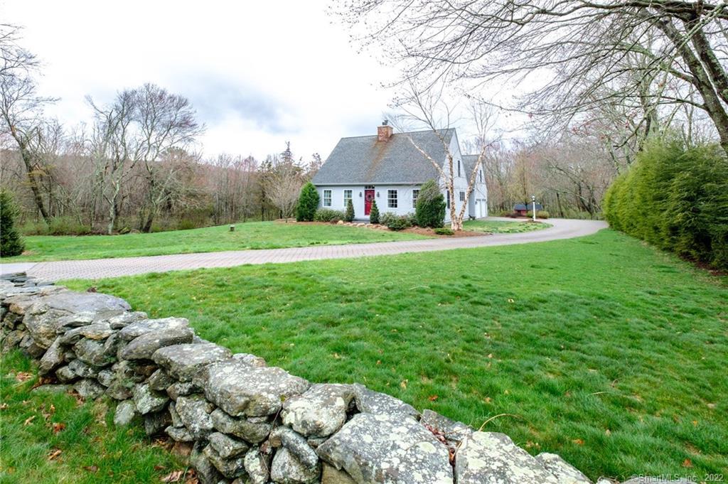 59 River Road Colchester, CT 06415 - Photo 1 of 1 a view of a house with a yard