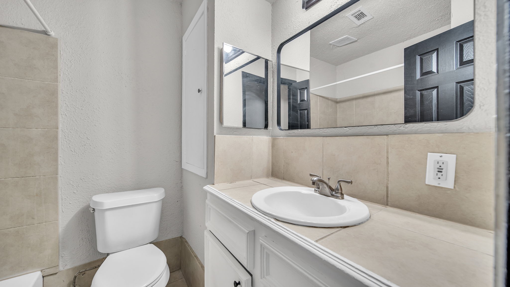 10902 Jutland Road Houston, TX 77048 - Photo 13 of 20 a bathroom with a sink and a toilet