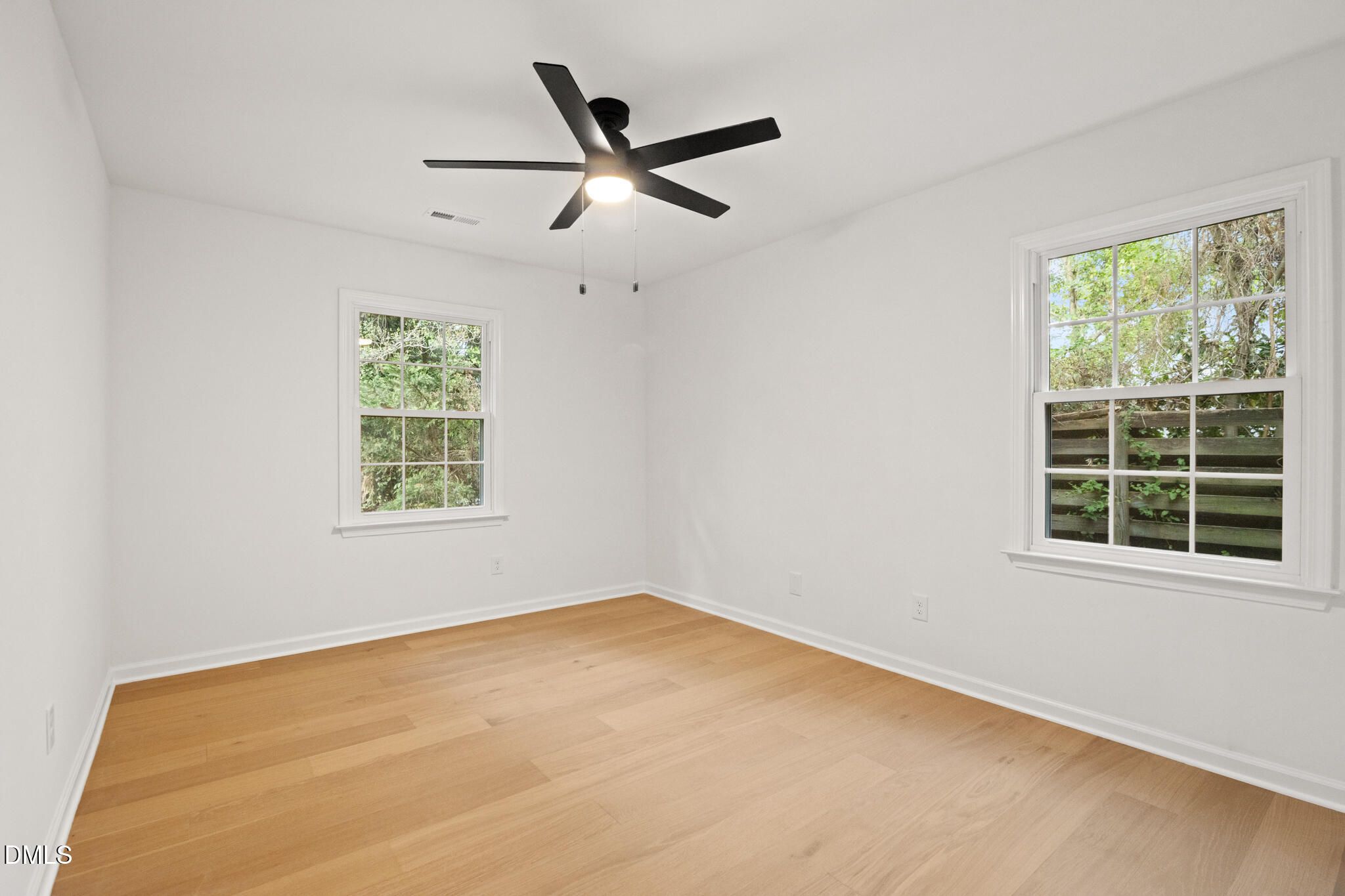 3509 Morningside Drive Raleigh, NC 27607 - Photo 37 of 49 an empty room with a window