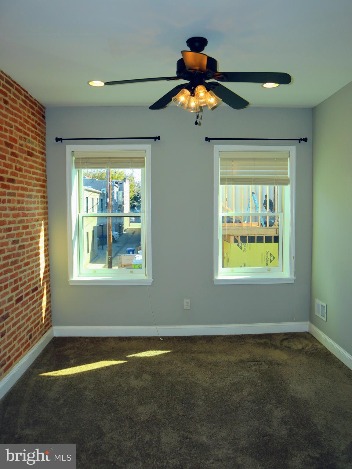926 South Curley Street Baltimore, MD 21224 - Photo 15 of 25 an empty room with a window