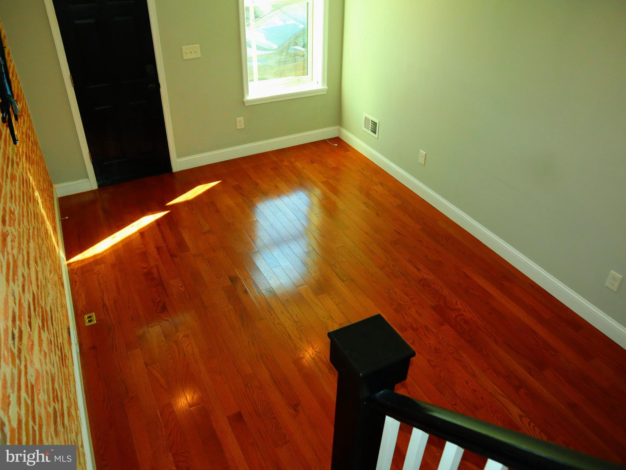926 South Curley Street Baltimore, MD 21224 - Photo 4 of 25 a view of empty room with window