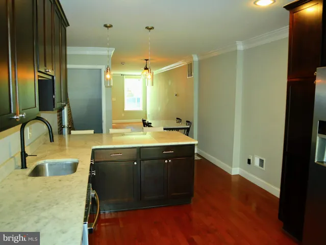 a bathroom with a sink double vanity and a mirror