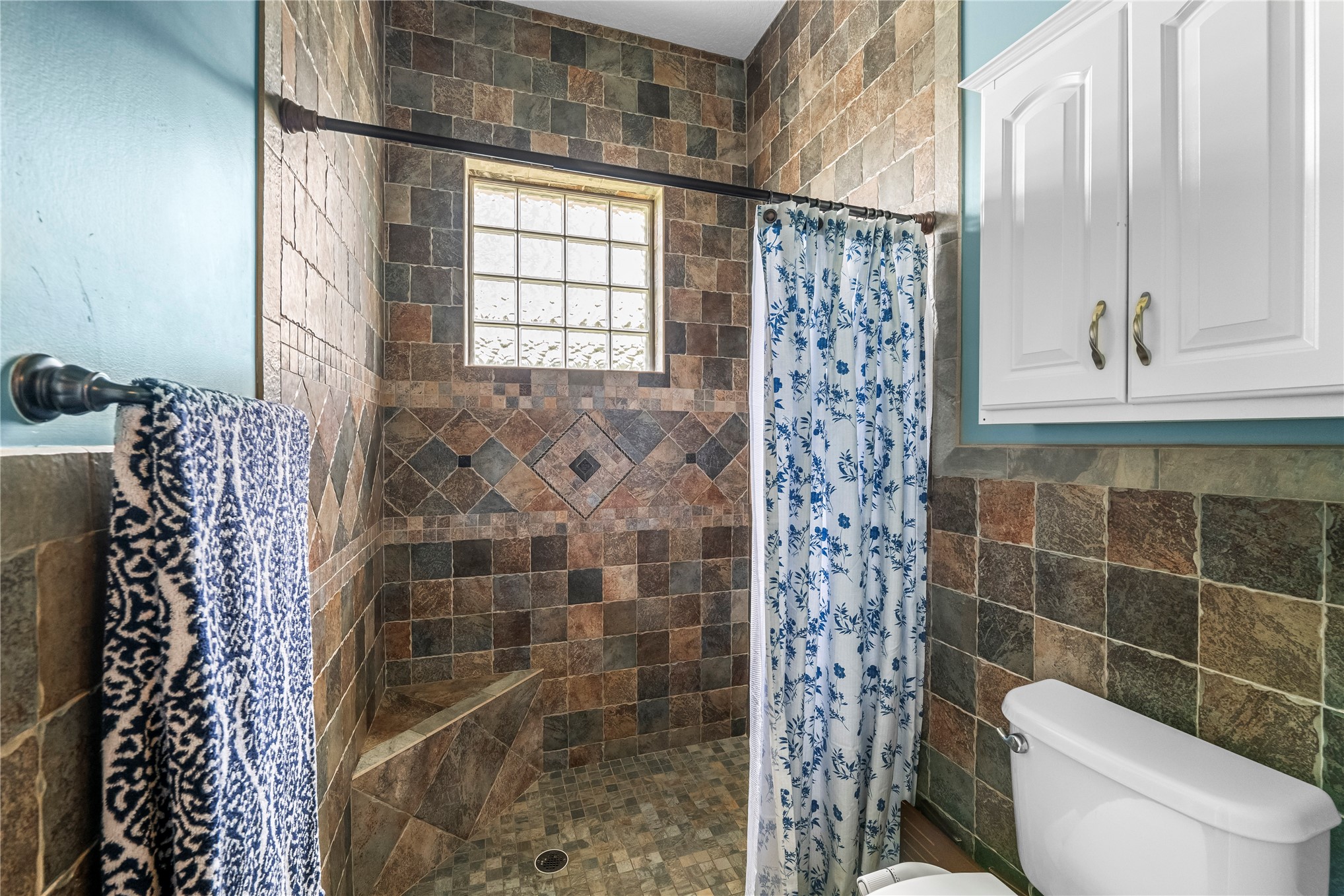 27247 Hallman Road Hilliard, FL 32046 - Photo 41 of 59 a bathroom with a toilet and shower