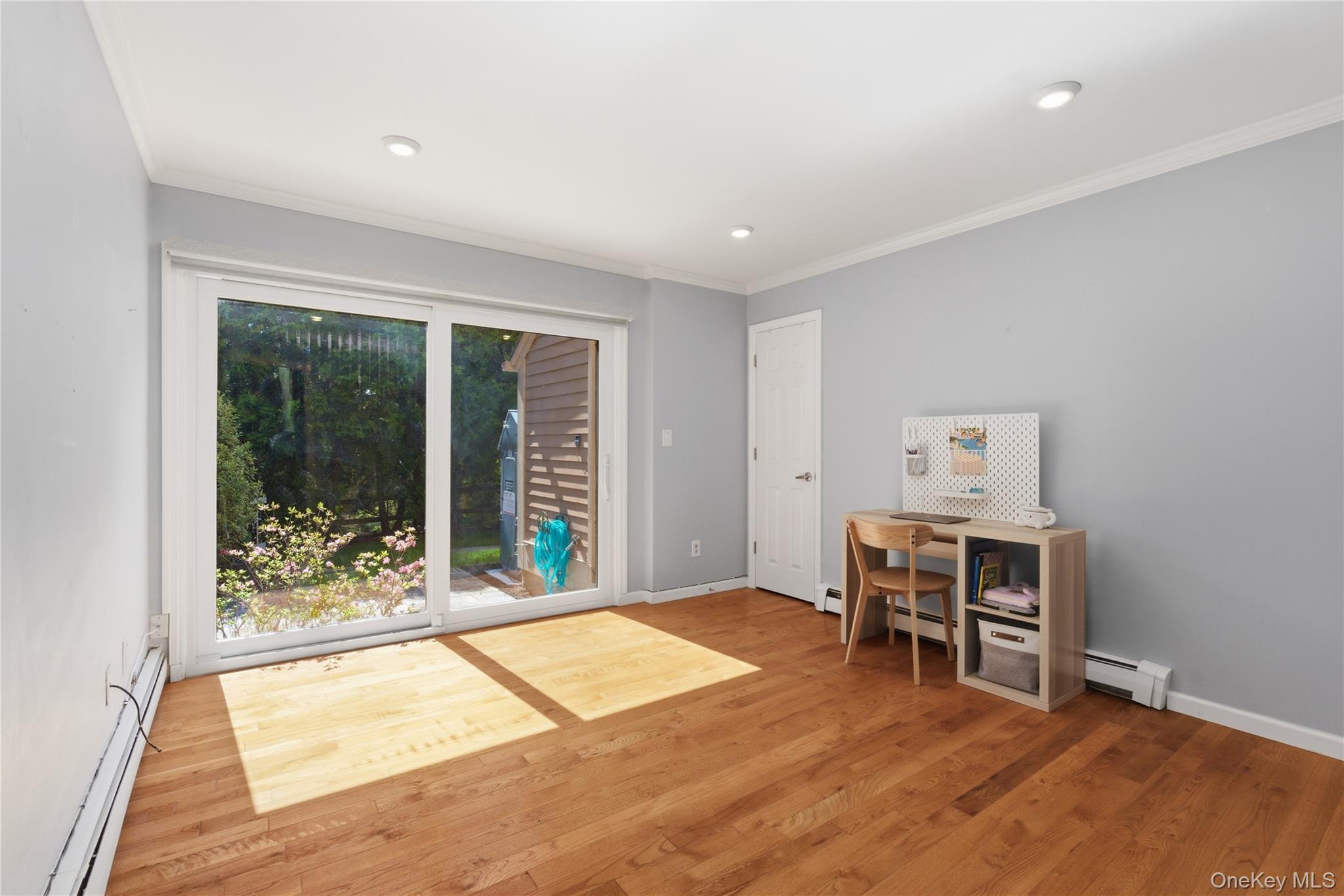 245 Tree Top Crescent Rye Brook, NY 10573 - Photo 11 of 24 a room with furniture and a window