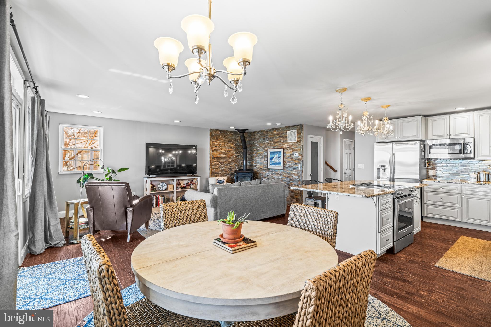 3930 Glenhurst Road Baltimore, MD 21222 - Photo 13 of 29 a view of a dining room with furniture and wooden floor