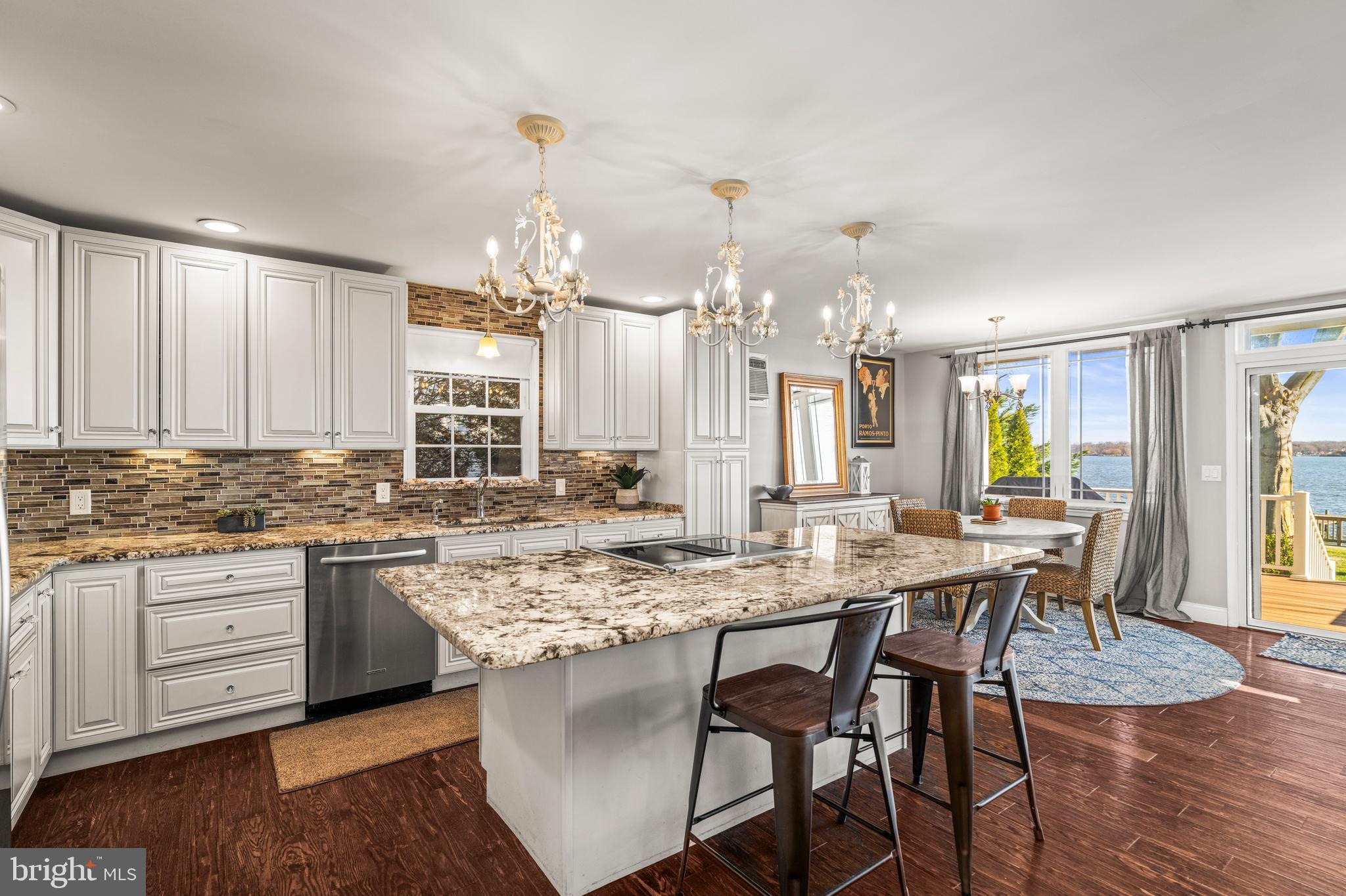 3930 Glenhurst Road Baltimore, MD 21222 - Photo 2 of 29 a kitchen with a table and chairs in it