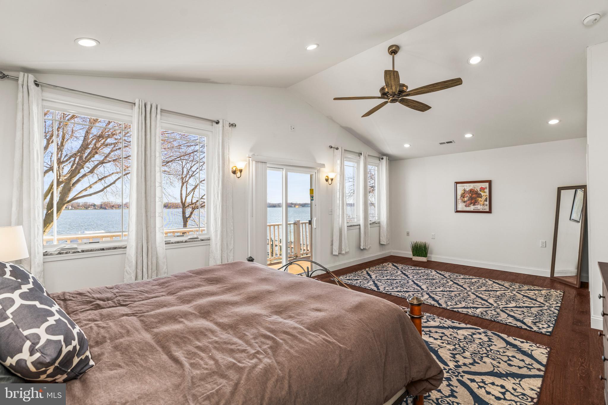 3930 Glenhurst Road Baltimore, MD 21222 - Photo 20 of 29 a bedroom with a large bed and a window