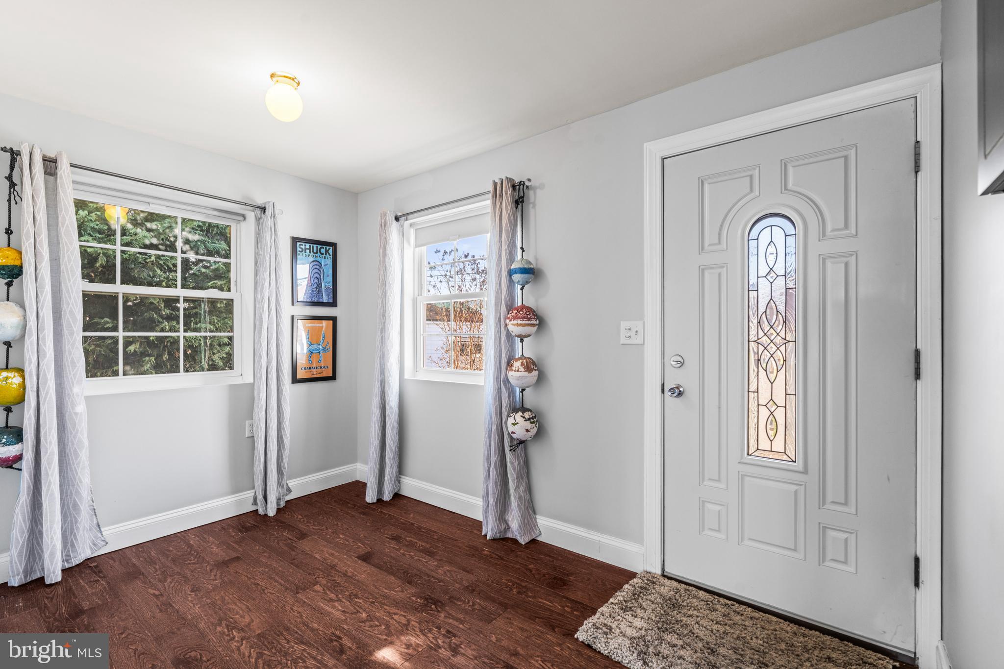 3930 Glenhurst Road Baltimore, MD 21222 - Photo 9 of 29 an empty room with windows and closet