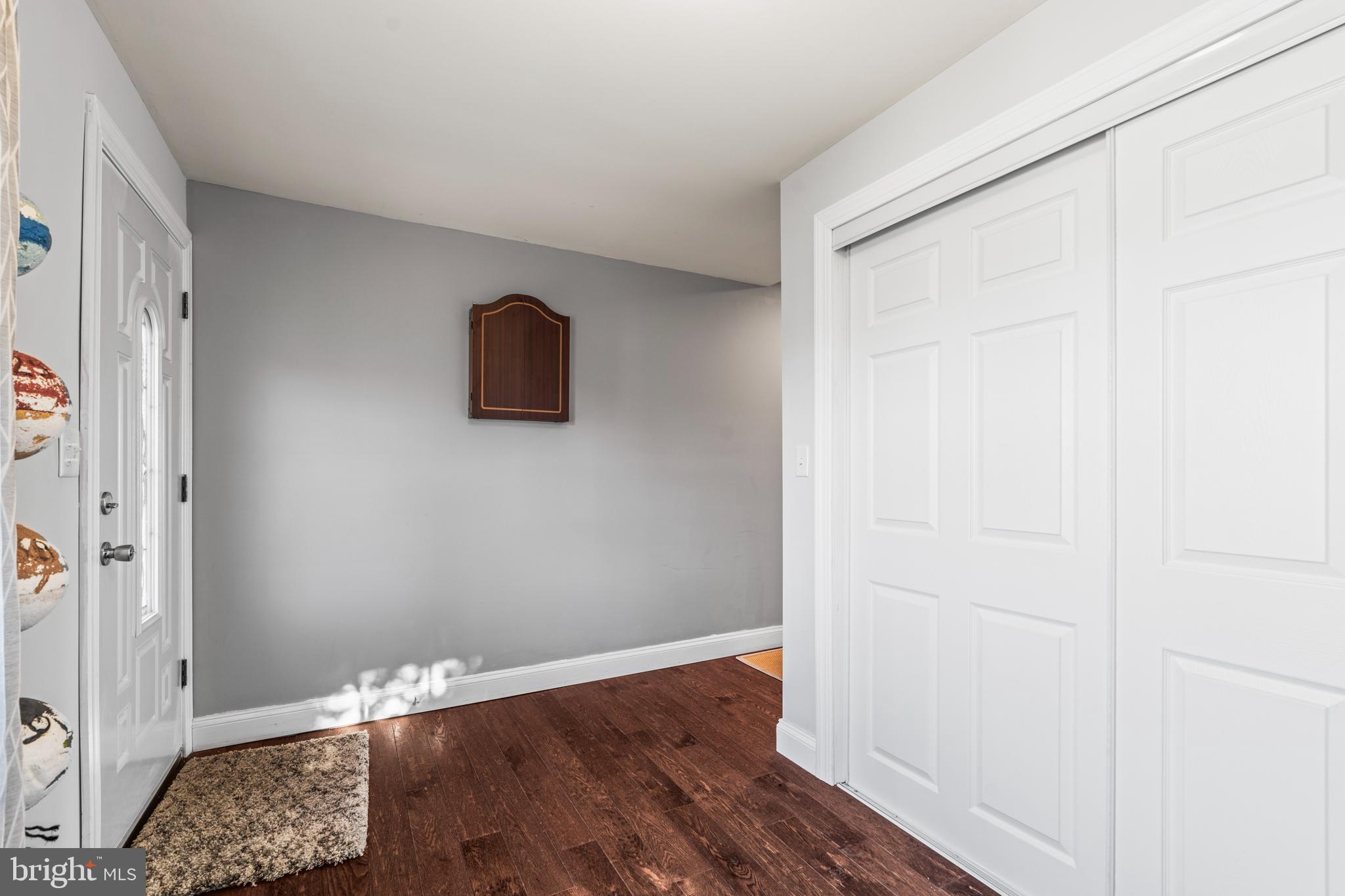 3930 Glenhurst Road Baltimore, MD 21222 - Photo 10 of 29 a wooden floor in a gallery