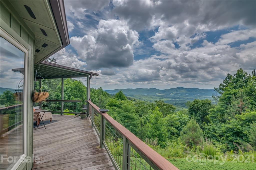 281 Big Rock Road Bostic, NC 28018 - Photo 2 of 48 a view of a balcony with chairs
