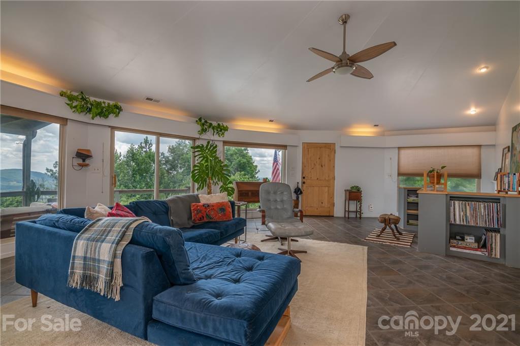 281 Big Rock Road Bostic, NC 28018 - Photo 13 of 48 a living room with furniture and a large window