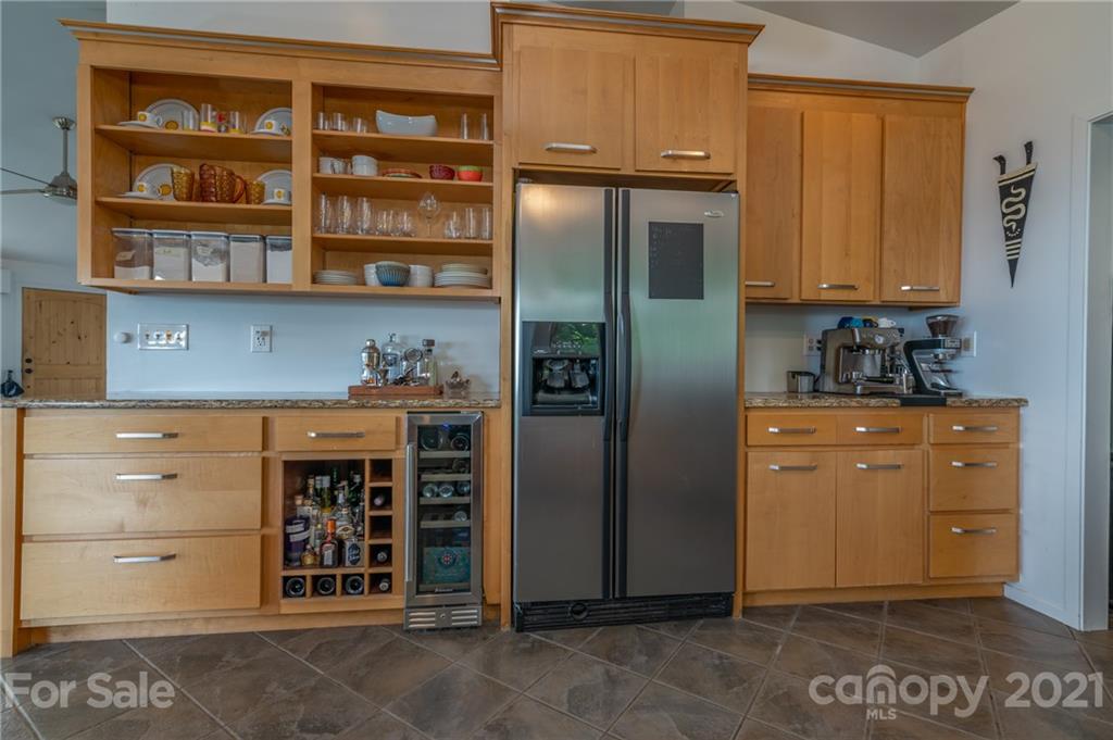 281 Big Rock Road Bostic, NC 28018 - Photo 17 of 48 a kitchen with stainless steel appliances a refrigerator and cabinets