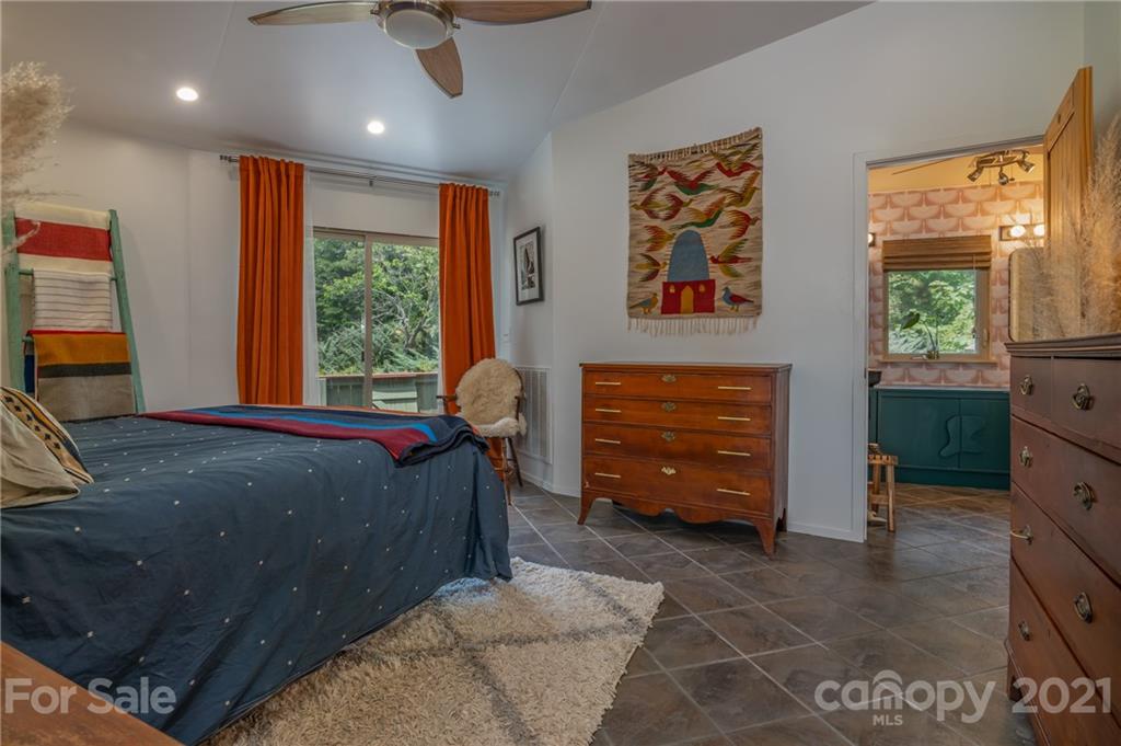 281 Big Rock Road Bostic, NC 28018 - Photo 19 of 48 a bed room with a bed and a television