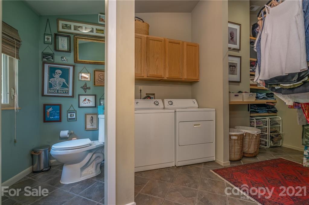 281 Big Rock Road Bostic, NC 28018 - Photo 20 of 48 a bathroom with a sink a toilet and a mirror