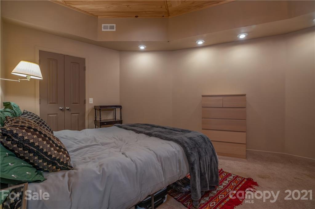 281 Big Rock Road Bostic, NC 28018 - Photo 25 of 48 a bedroom with a bed and a walk in closet