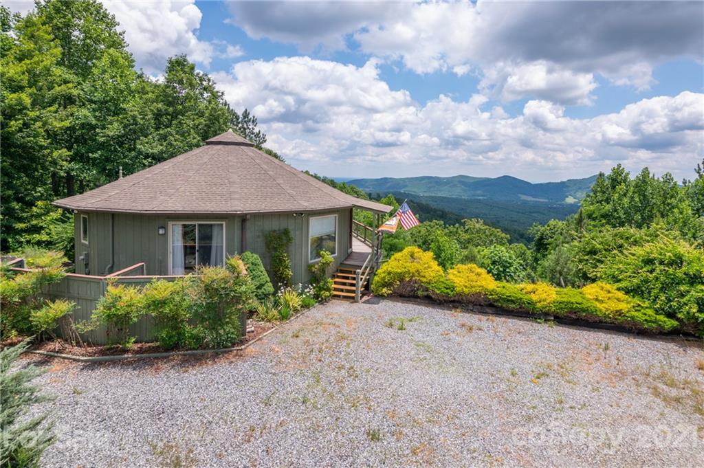 281 Big Rock Road Bostic, NC 28018 - Photo 4 of 48 a view of a house with a garden