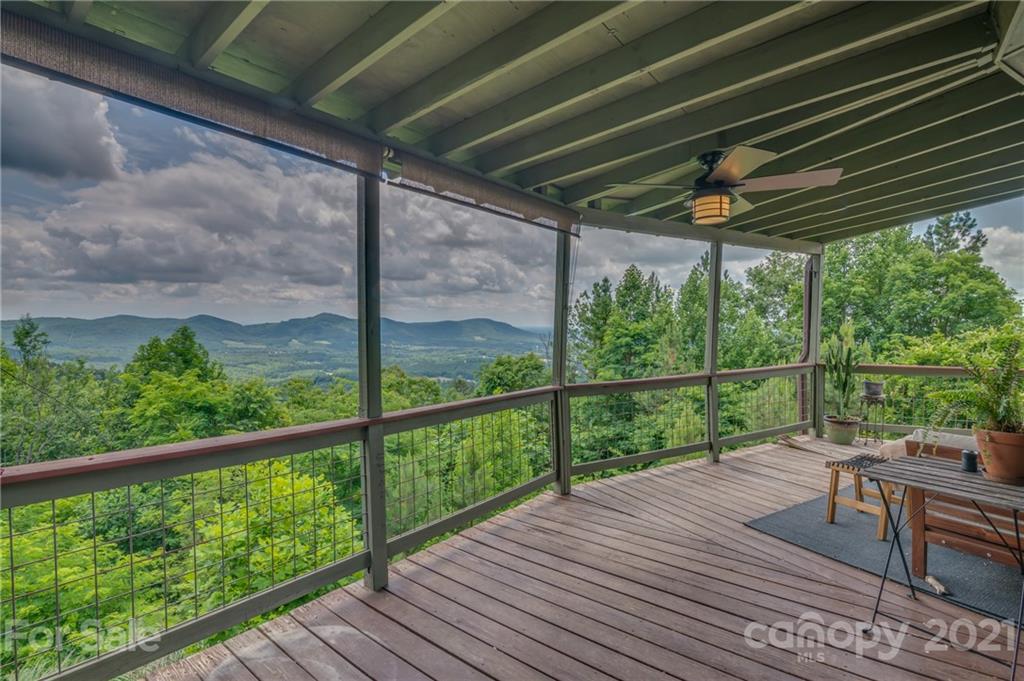 281 Big Rock Road Bostic, NC 28018 - Photo 33 of 48 a balcony with wooden floor