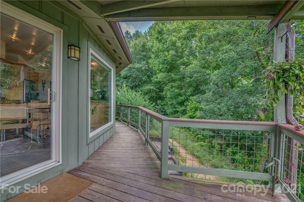 281 Big Rock Road Bostic, NC 28018 - Photo 40 of 48 a view of a balcony with wooden floor